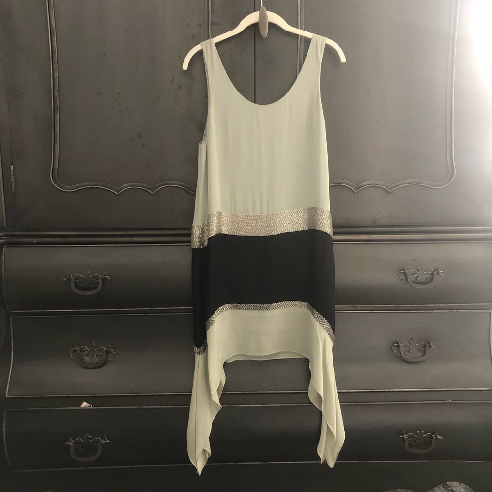 Cocktail dress with handkerchief hem